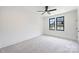Bright bedroom offers plush carpet, large windows, and modern finishes at 7011 Chateau Bordeaux Ln, Charlotte, NC 28270