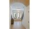 Elegant foyer entrance with hardwood floors and grand staircase at 7011 Chateau Bordeaux Ln, Charlotte, NC 28270