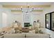 Inviting living room with a cozy fireplace, built-in cabinets, and sophisticated decor at 7011 Chateau Bordeaux Ln, Charlotte, NC 28270