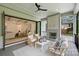 Outdoor porch featuring a fireplace and seamless indoor-outdoor living at 7011 Chateau Bordeaux Ln, Charlotte, NC 28270