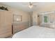 Bedroom featuring a comfortable bed, closet with mirrored doors, and ample storage at 7164 Moss Point Dr, Charlotte, NC 28277