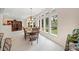 Dining Room with large windows showcasing backyard at 7164 Moss Point Dr, Charlotte, NC 28277