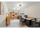 Well-lit office space with a desk, shelves, and a comfortable chair at 7164 Moss Point Dr, Charlotte, NC 28277