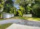 Spacious backyard with storage sheds and mature trees at 7812 Old Concord Rd, Salisbury, NC 28146