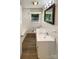Bathroom with a vanity sink, a tile backsplash, and a window that allows for natural light at 7812 Old Concord Rd, Salisbury, NC 28146
