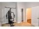 Carpeted room featuring black and red exercise equipment at 8388 Waxhaw Hwy, Waxhaw, NC 28173