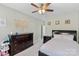Bedroom featuring dark wood furniture, light green walls, and a cozy atmosphere at 9801 Blackbird Hill Ln, Mint Hill, NC 28227