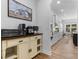 Kitchen counter area with white cabinets, stainless steel appliances, and views into a dining area at 9801 Blackbird Hill Ln, Mint Hill, NC 28227
