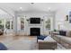 Bright living space with fireplace, views to the backyard and an open layout at 9801 Blackbird Hill Ln, Mint Hill, NC 28227
