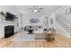 Spacious living room with fireplace, bright windows, and lots of seating at 9801 Blackbird Hill Ln, Mint Hill, NC 28227
