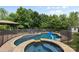 Enjoy the backyard retreat, featuring an in-ground pool, a hot tub, a gazebo, and a lush green surrounding at 9801 Blackbird Hill Ln, Mint Hill, NC 28227