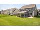 An expansive, green backyard includes a fenced yard and patio at 1009 Hampton Grove Rd, Waxhaw, NC 28173