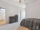 Bedroom with natural light, neutral walls, carpet and minimal decor at 1009 Hampton Grove Rd, Waxhaw, NC 28173