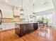 Bright kitchen featuring a large island, stainless steel appliances, and breakfast nook at 1009 Hampton Grove Rd, Waxhaw, NC 28173