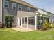 A beautiful sunroom extends from the home to the back yard at 1009 Hampton Grove Rd, Waxhaw, NC 28173