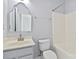 Bathroom featuring a white vanity, toilet and shower with bathtub at 1009 Murandy Ln, Matthews, NC 28104
