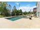 Backyard oasis featuring a luxurious pool and well-manicured lawn perfect for relaxation at 1009 Murandy Ln, Matthews, NC 28104