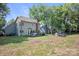Large backyard with a deck and recreational equipment for children at 1045 Fairway Ridge Nw Rd, Concord, NC 28027
