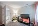 Comfortable bedroom with a toddler bed, soft lighting, and neutral decor at 1045 Fairway Ridge Nw Rd, Concord, NC 28027
