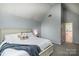 Comfortable bedroom with full bed, gray carpet and access to en-suite bathroom at 110 Club Dr, Mooresville, NC 28115