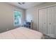 Cozy bedroom with a large window for natural light and built-in storage solutions at 110 Club Dr, Mooresville, NC 28115