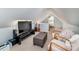 Upstairs room featuring comfortable seating, a media center and natural light at 110 Club Dr, Mooresville, NC 28115