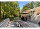 Multi-level back deck with a grill and gazebo, offering a versatile space for outdoor living and entertaining at 11329 Torino Rd, Matthews, NC 28105