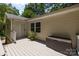 Inviting back deck with a storage box, ideal for enjoying the outdoors and providing practical storage at 11329 Torino Rd, Matthews, NC 28105