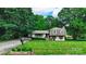 Well-kept house with a green lawn, cozy dormer windows, and an American flag at 121 Pelham Ln, Fort Mill, SC 29715
