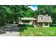 Inviting home with a brick exterior, lush lawn, and a convenient carport at 121 Pelham Ln, Fort Mill, SC 29715