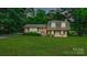 Attractive home with a brick facade, spacious lawn, and a welcoming entrance at 121 Pelham Ln, Fort Mill, SC 29715