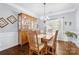 Cozy dining room with beautiful hardwood floors, and classic furnishings at 129 Nims Spring Dr, Fort Mill, SC 29715