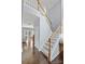 Welcoming two-story foyer showcases a staircase with wood railings and open sightlines at 129 Nims Spring Dr, Fort Mill, SC 29715