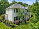 Charming two-story home featuring well-maintained landscaping and a classic design at 129 Nims Spring Dr, Fort Mill, SC 29715