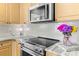 Kitchen featuring stainless steel appliances, granite countertops, and natural light at 129 Nims Spring Dr, Fort Mill, SC 29715