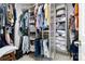 Organized walk-in closet with custom shelving and ample storage space for clothes and accessories at 129 Nims Spring Dr, Fort Mill, SC 29715