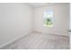 Bedroom featuring carpeted floor and a window providing natural light, creating a cozy atmosphere at 12912 Canterbury Castle Dr, Charlotte, NC 28273