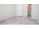 Bedroom featuring carpeted floor and a door to the closet at 12912 Canterbury Castle Dr, Charlotte, NC 28273