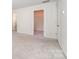 Spacious carpeted bedroom with ensuite bath and walk in closet at 12912 Canterbury Castle Dr, Charlotte, NC 28273