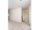 Upstairs hallway showing carpet and access to rooms at 12912 Canterbury Castle Dr, Charlotte, NC 28273