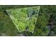 Aerial view of wooded property with boundary lines at 140 Rustic Way Ln, Mooresville, NC 28117
