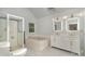 Bright bathroom features a soaking tub, walk-in shower, and a double sink vanity with modern lighting and fixtures at 140 Rustic Way Ln, Mooresville, NC 28117