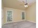 Spacious bedroom with a vaulted ceiling, ceiling fan, and bright windows at 140 Rustic Way Ln, Mooresville, NC 28117