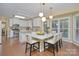 Modern kitchen and dining area features an eat-in table and bright windows at 140 Rustic Way Ln, Mooresville, NC 28117