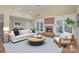 Tastefully staged living room with a modern fireplace, plush seating, and stylish decor at 140 Rustic Way Ln, Mooresville, NC 28117