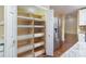 Pantry featuring wood shelving and pull-out drawers at 140 Rustic Way Ln, Mooresville, NC 28117