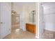 Bathroom sink and walk-in closet next to a bedroom at 14103 Hiawatha Ct, Huntersville, NC 28078