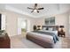 The main bedroom features a neutral color palette and ample space at 14103 Hiawatha Ct, Huntersville, NC 28078