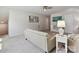 Comfortable living room with neutral decor, a sofa, and a television mounted on the wall at 15614 Aviary Orchard Way, Charlotte, NC 28278