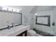 Modern bathroom with a walk-in shower, square sink, and stylish fixtures at 15724 Eagleview Dr, Charlotte, NC 28278